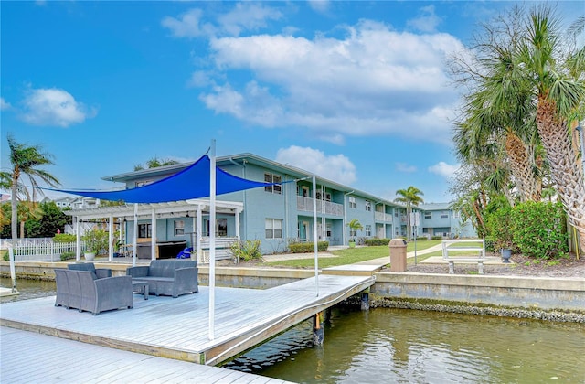 dock area with a water view