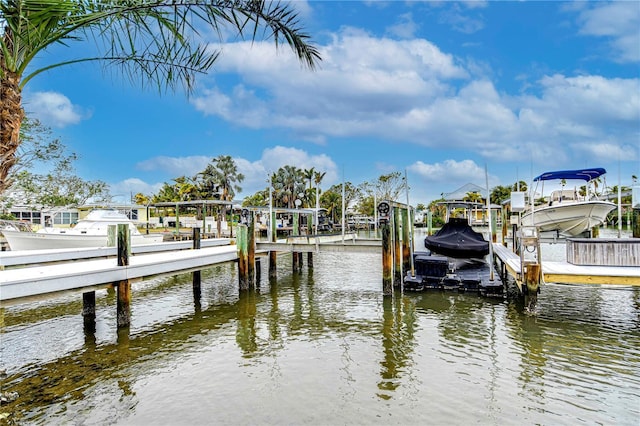 view of dock with a water view and boat lift