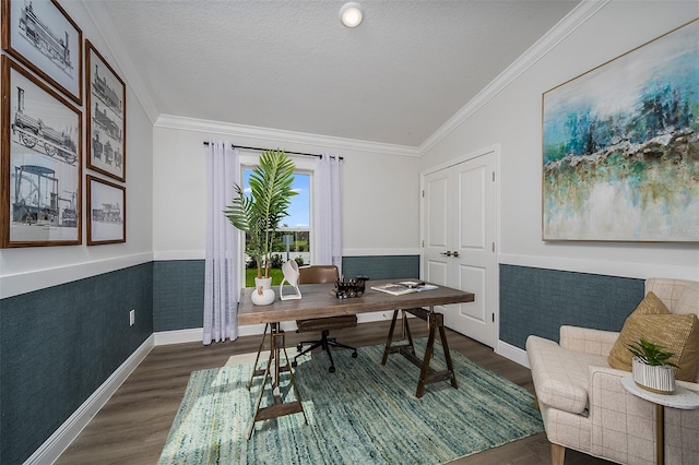 home office with a textured ceiling, lofted ceiling, ornamental molding, and dark wood-type flooring