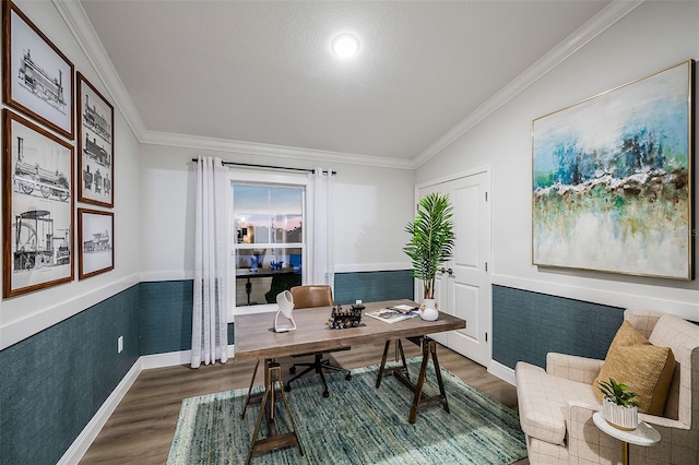 home office featuring lofted ceiling, crown molding, and dark hardwood / wood-style floors