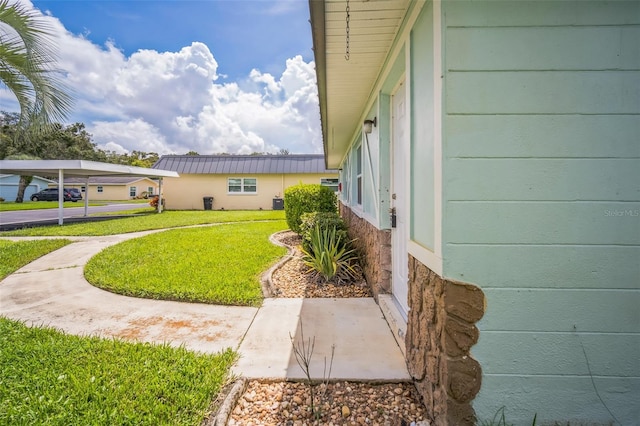 view of home's exterior featuring a yard and cooling unit