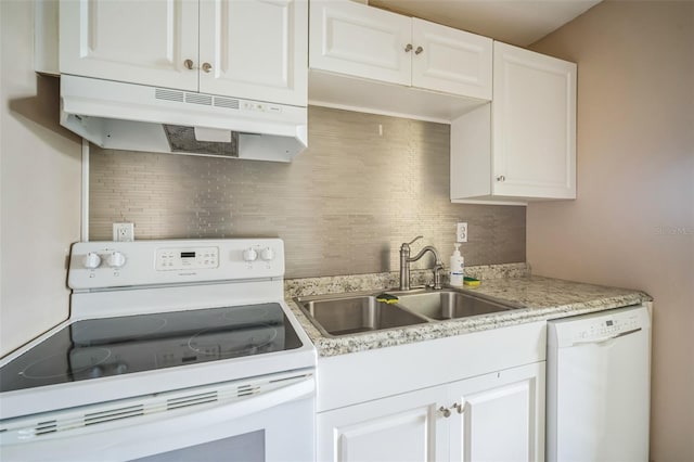 kitchen featuring backsplash, white cabinetry, white appliances, and sink