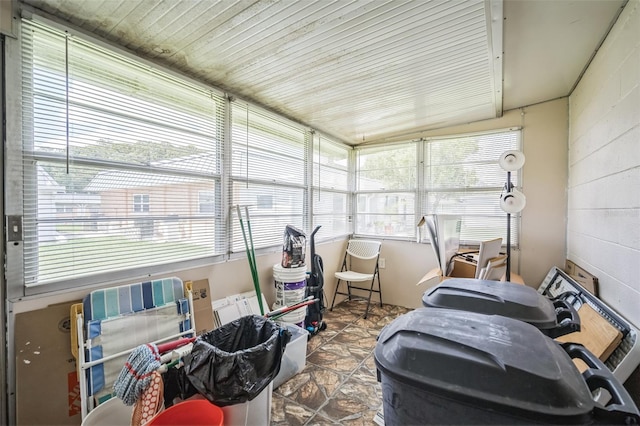 sunroom / solarium featuring wood ceiling