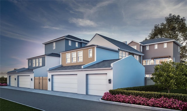 view of front of property with a garage