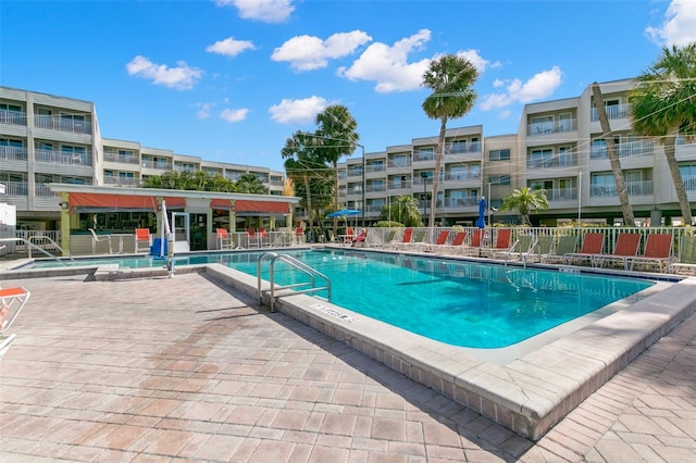 view of pool featuring a patio area