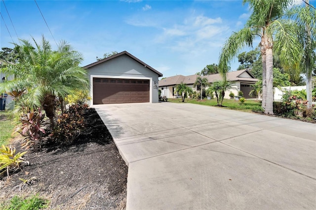 ranch-style home featuring a garage