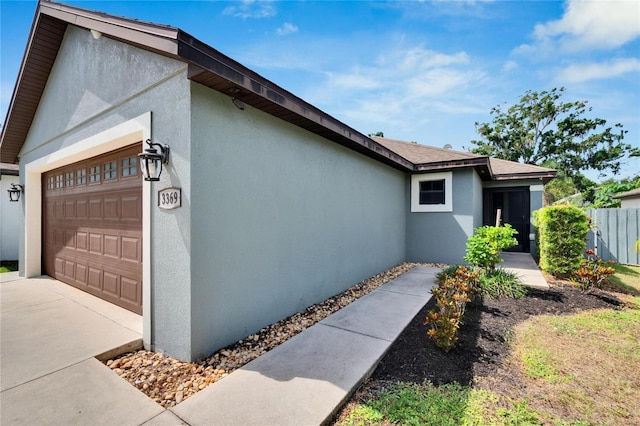 view of home's exterior with a garage