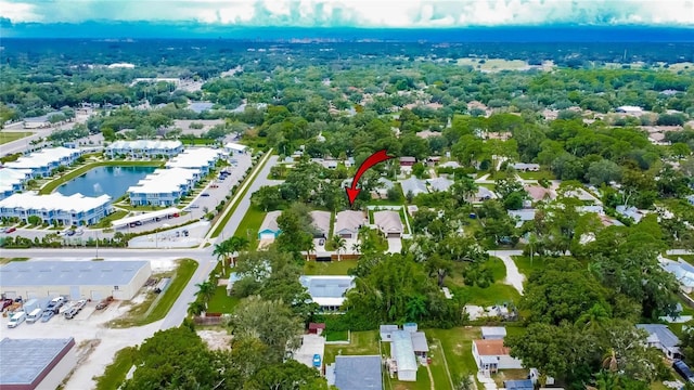 drone / aerial view featuring a water view