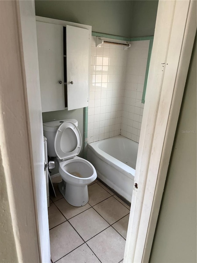 bathroom featuring tile patterned floors and toilet