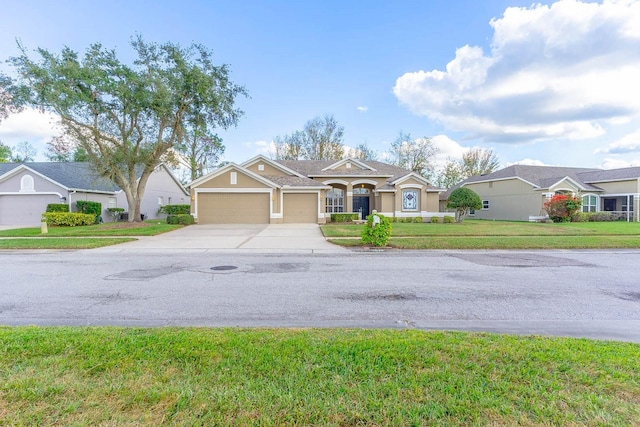 ranch-style house with a front lawn and a garage