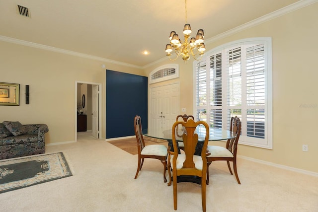 carpeted dining area featuring ornamental molding and a notable chandelier