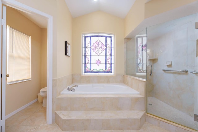 bathroom featuring toilet, tile patterned floors, vaulted ceiling, and plus walk in shower