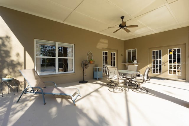 view of patio with french doors and ceiling fan