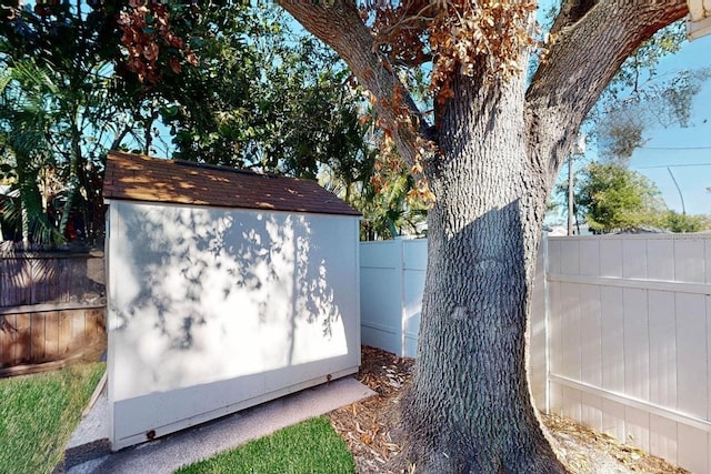 exterior space featuring a shed