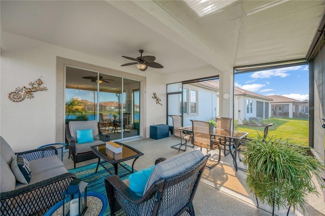 sunroom / solarium with ceiling fan