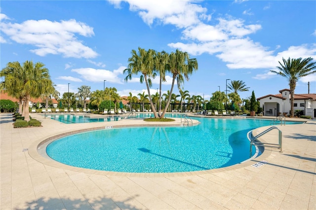 view of pool featuring a patio