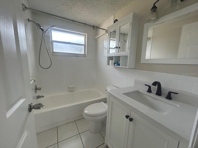 full bathroom with a textured ceiling, tile patterned flooring, shower / tub combination, toilet, and vanity