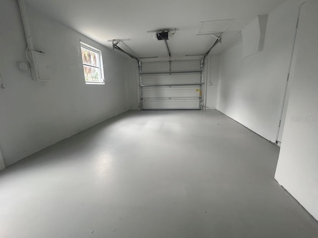 garage featuring a garage door opener