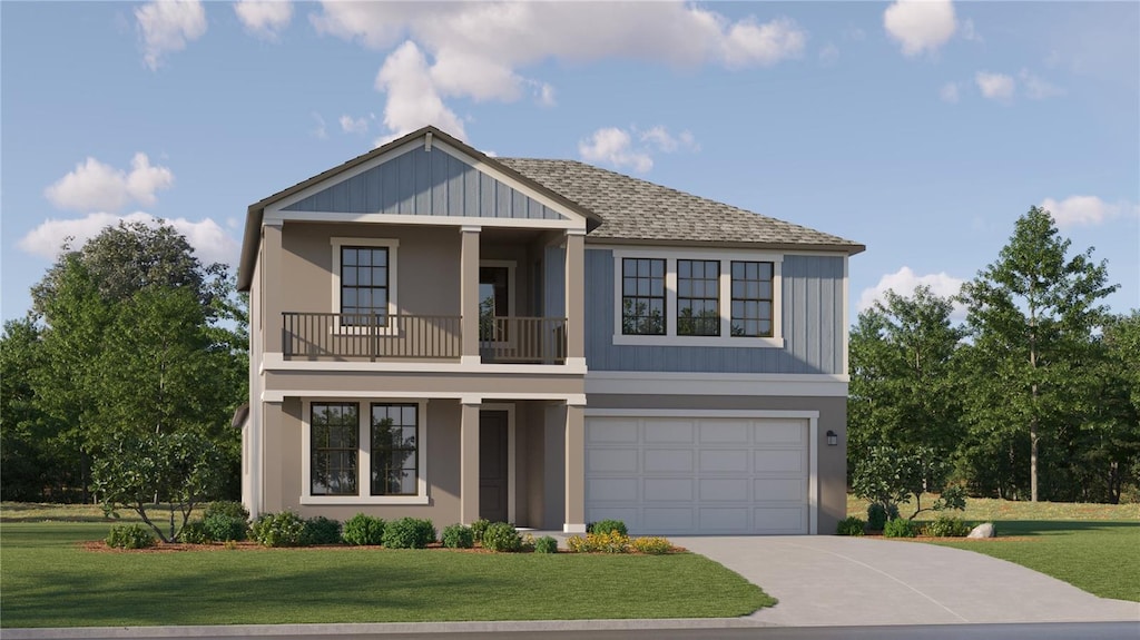 view of front of property featuring a front yard, a balcony, and a garage