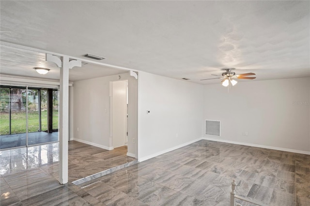 unfurnished room featuring ceiling fan