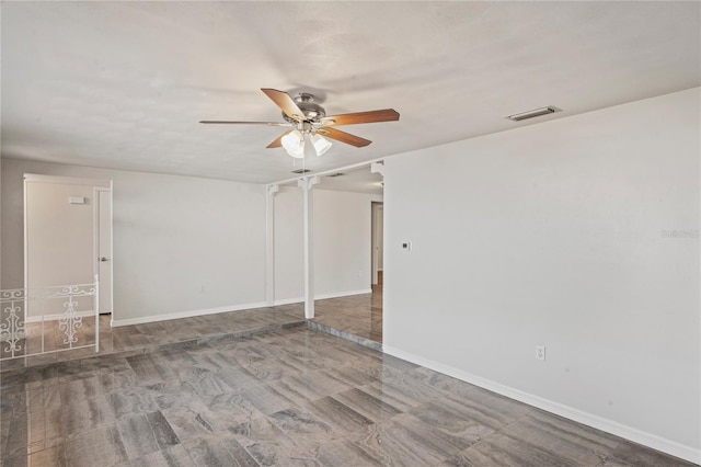 unfurnished room featuring ceiling fan