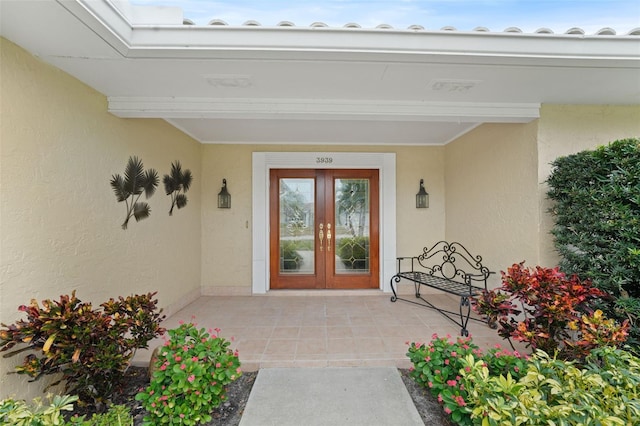 entrance to property featuring french doors