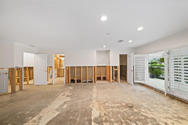 spare room featuring crown molding