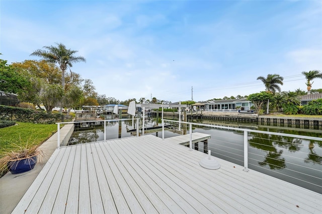 view of dock with a water view