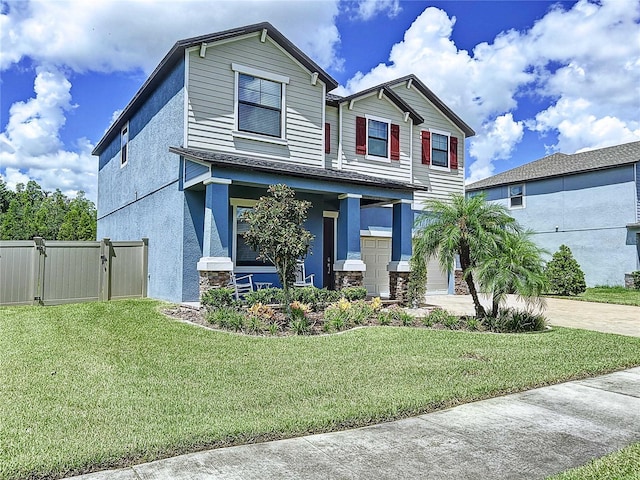 view of front facade featuring a front yard