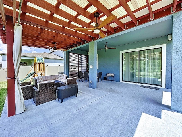 view of patio with outdoor lounge area and ceiling fan