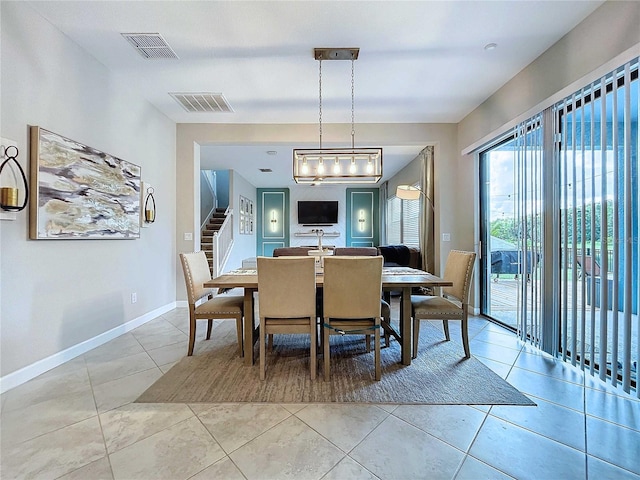 dining room featuring light tile patterned floors