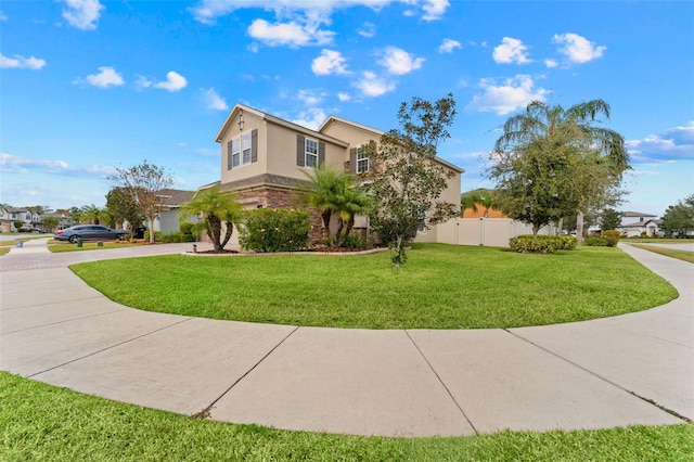 view of side of property with a lawn