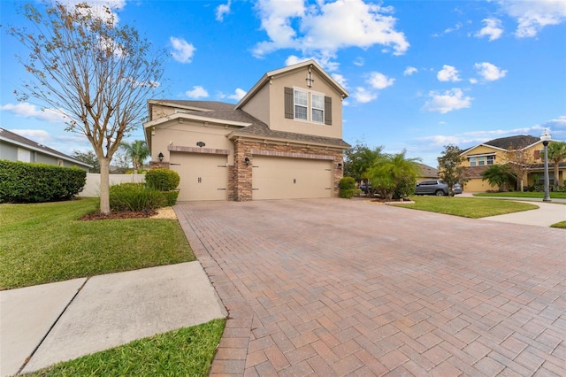 view of front of house with a front lawn and a garage