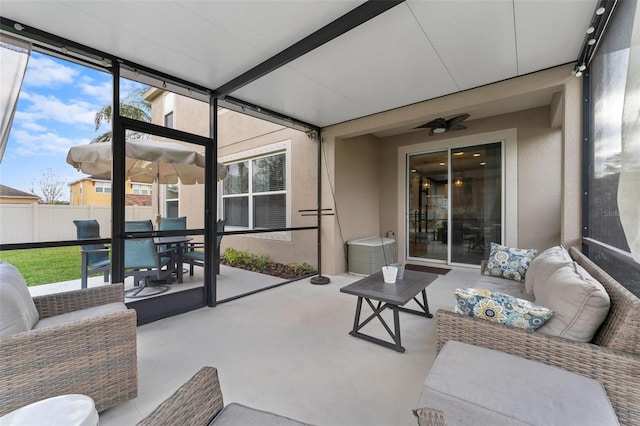 sunroom / solarium with plenty of natural light