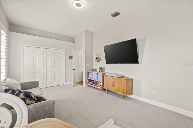 living room with light carpet