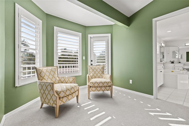 living area featuring tile patterned flooring