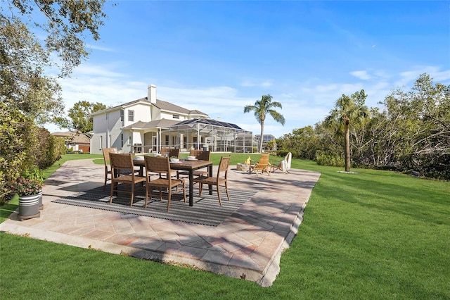 view of patio / terrace with a lanai