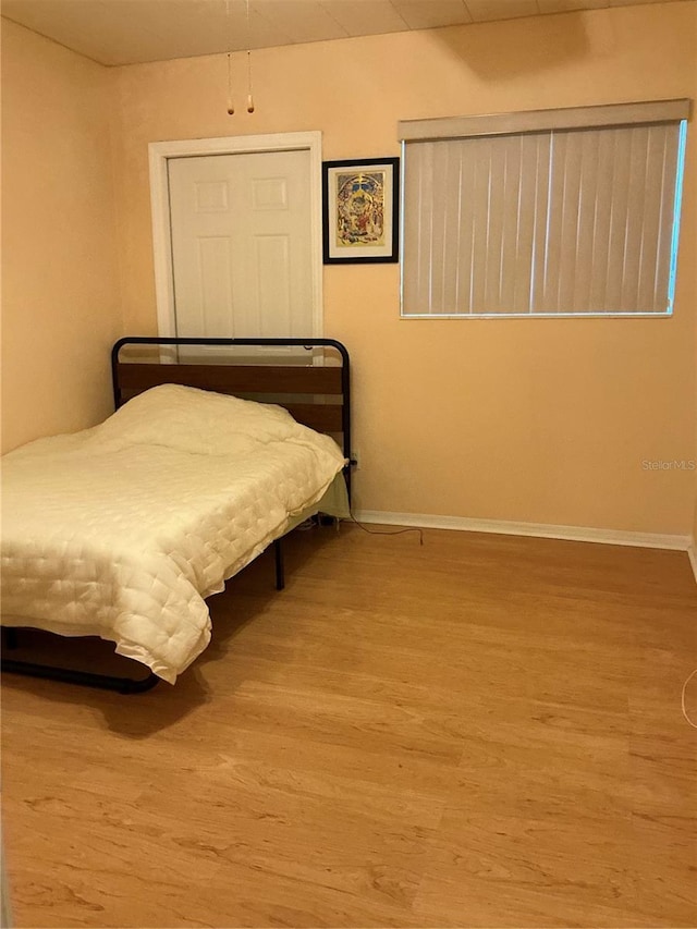 bedroom featuring light wood-type flooring