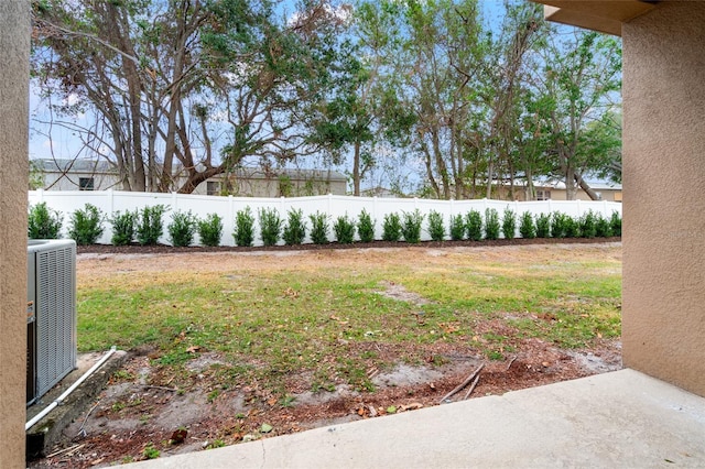 view of yard featuring central AC unit