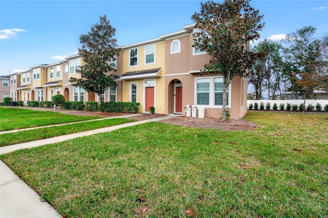 view of front of house with a front lawn