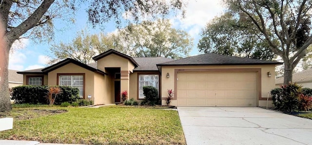 single story home with a garage and a front yard