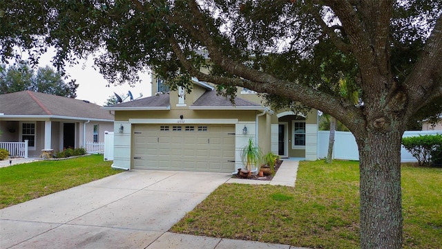 ranch-style home featuring a front yard and a garage