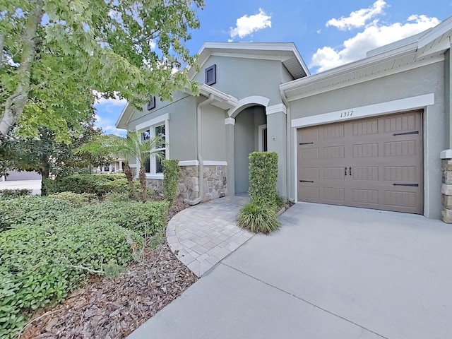 ranch-style home featuring a garage