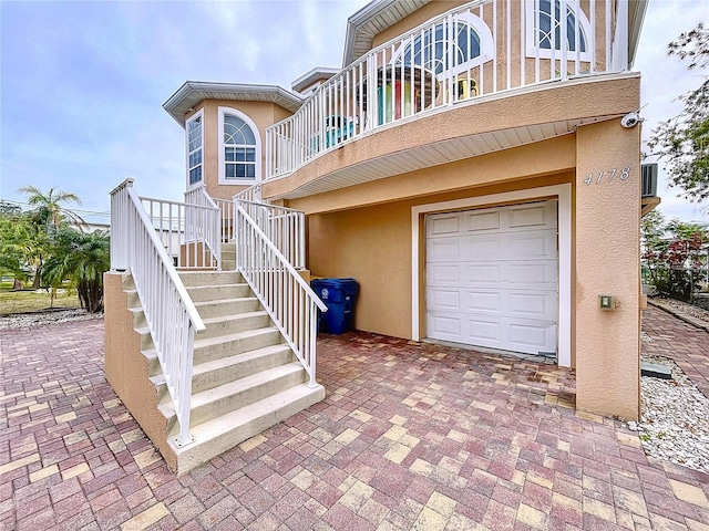 entrance to property featuring a garage