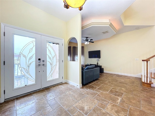 entryway with french doors and ceiling fan