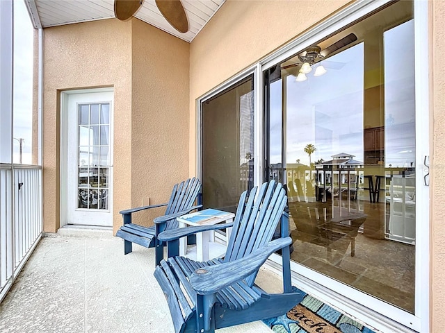 balcony featuring ceiling fan