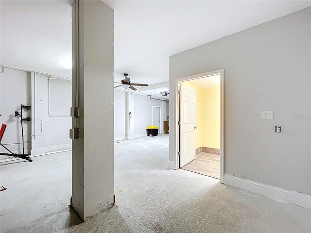 interior space featuring ceiling fan