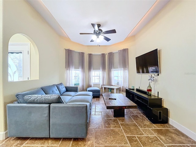 living room featuring ceiling fan