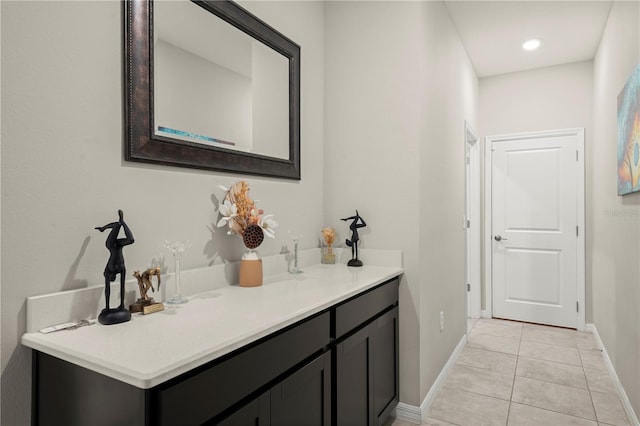 bathroom with vanity and tile patterned floors