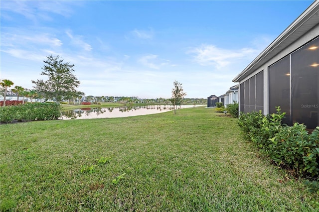 view of yard featuring a water view